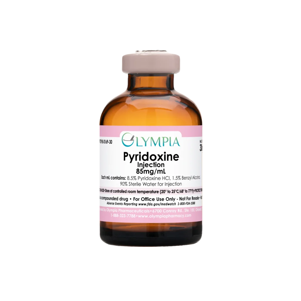 A 30mL amber sterile vial of compounded medication. The vial has a pink cap and label that reads, "Olympia Pyridoxine Injection 85mg/mL."