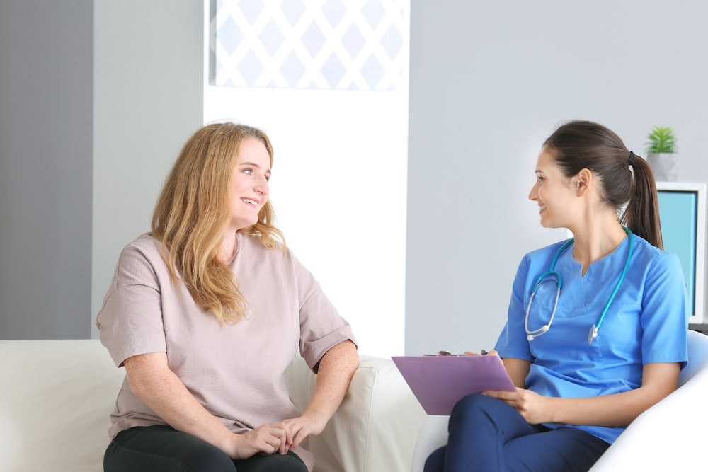 Physician discussing weight management with a patient