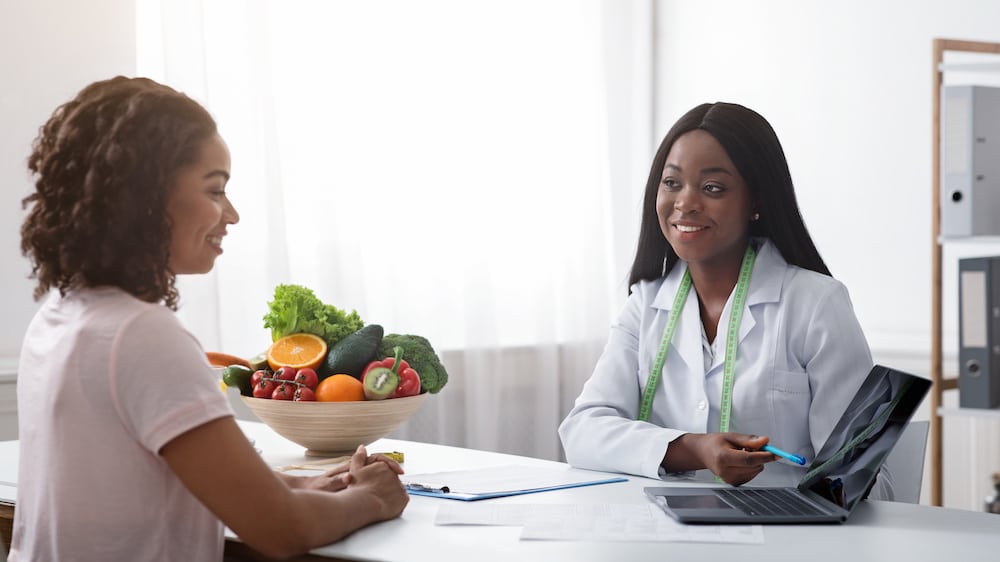 Physician discussing weight management with a patient