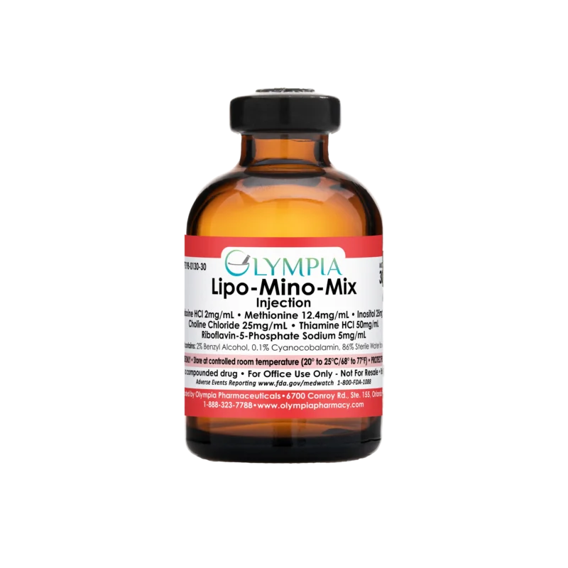 A vial of compounded lipotropic medication from Olympia. The vial is amber, has a black cap, and a red label that reads "Olympia Lipo-Mino-Mix Injection."