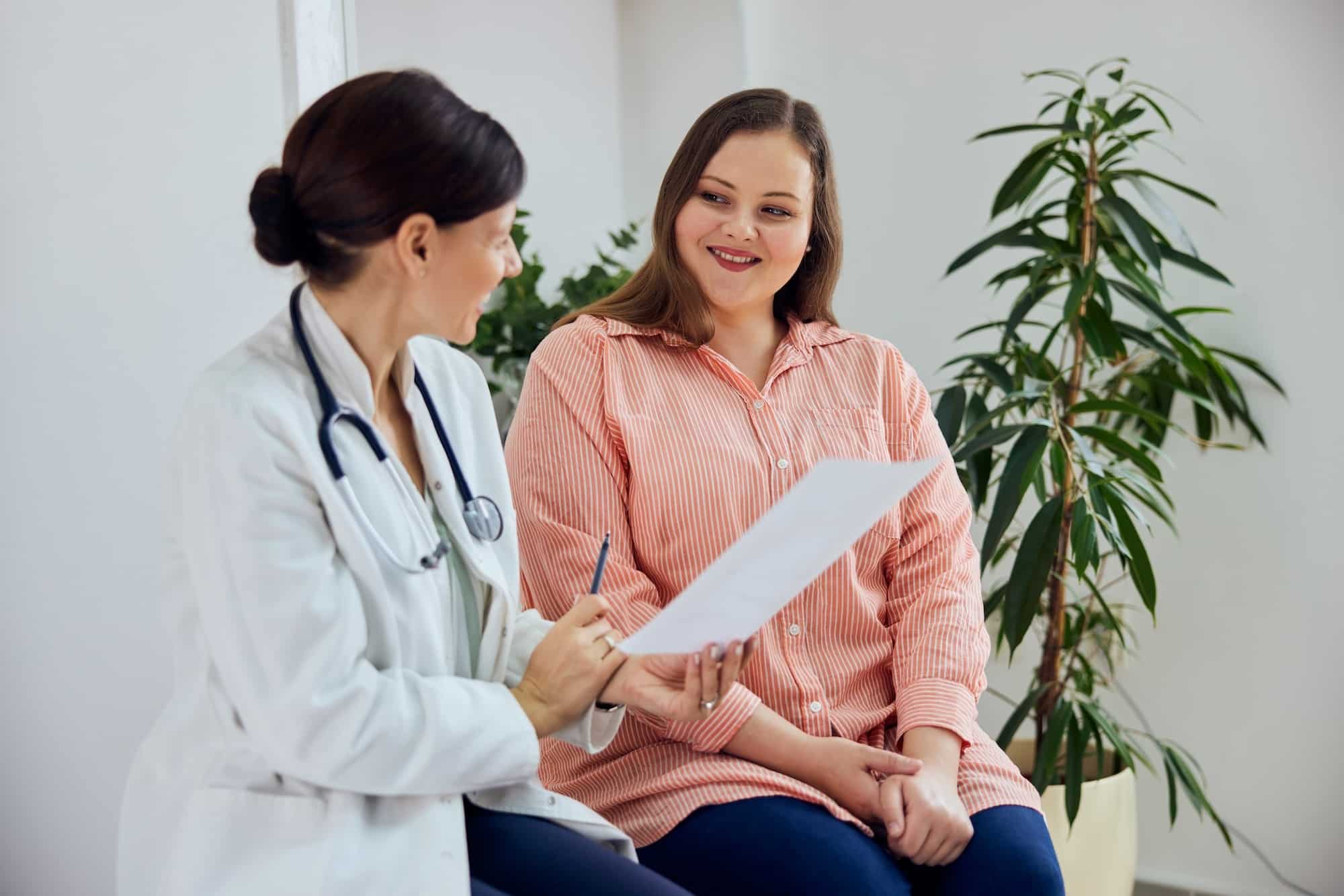 Doctor discussing personalized weight loss plan with patient
