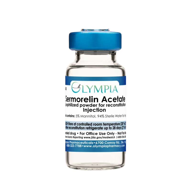 A small, clear vial with a blue cap and label. The label reads, "Olympia Sermorelin Acetate Lyophilized Powder for Reconstitution Injection."