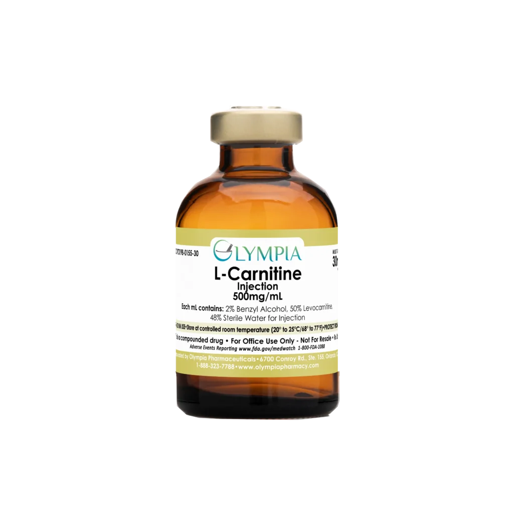 A vial of compounded injectable medication from Olympia. The vial is amber, and has a gold cap and a gold label that reads "Olympia L-Carnitine Injection 500mg/mL."