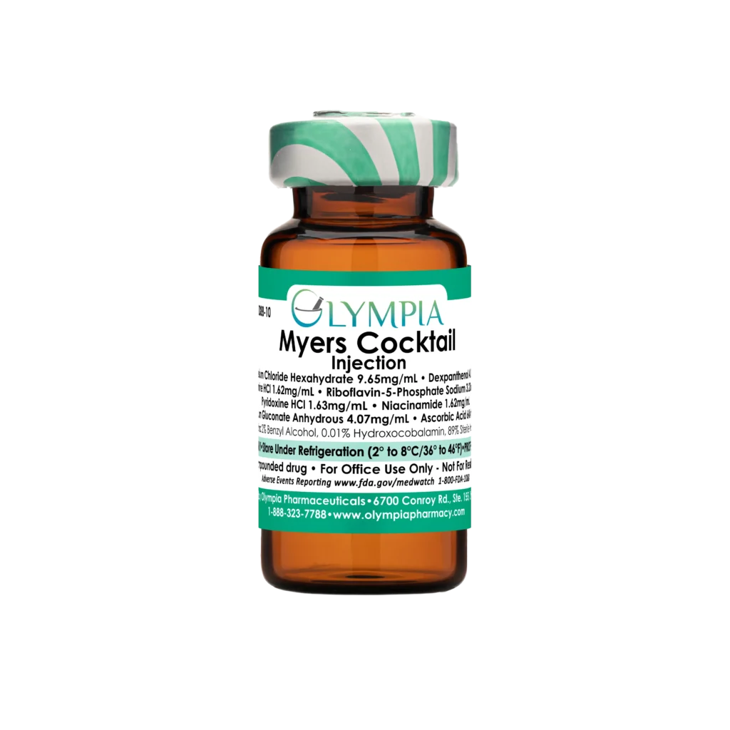 A vial of compounded injectable medication from Olympia. The vial is amber, has a green-striped cap, and a green label that reads "Olympia Myers Cocktail Injection."