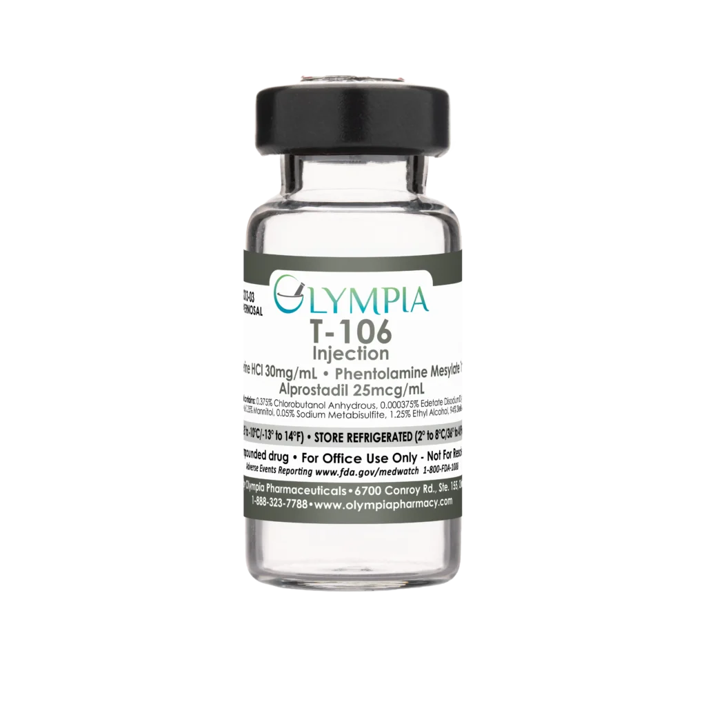 A vial of compounded Trimix ED medication from Olympia. The vial has a gray cap and a gray label that reads "Olympia T-106 Injection."