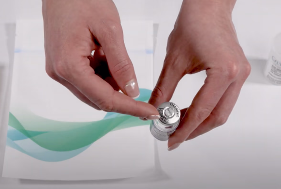 How to Remove the Metal Vial Cap from Olympia Products How to Remove the Metal Vial Cap from Olympia Products