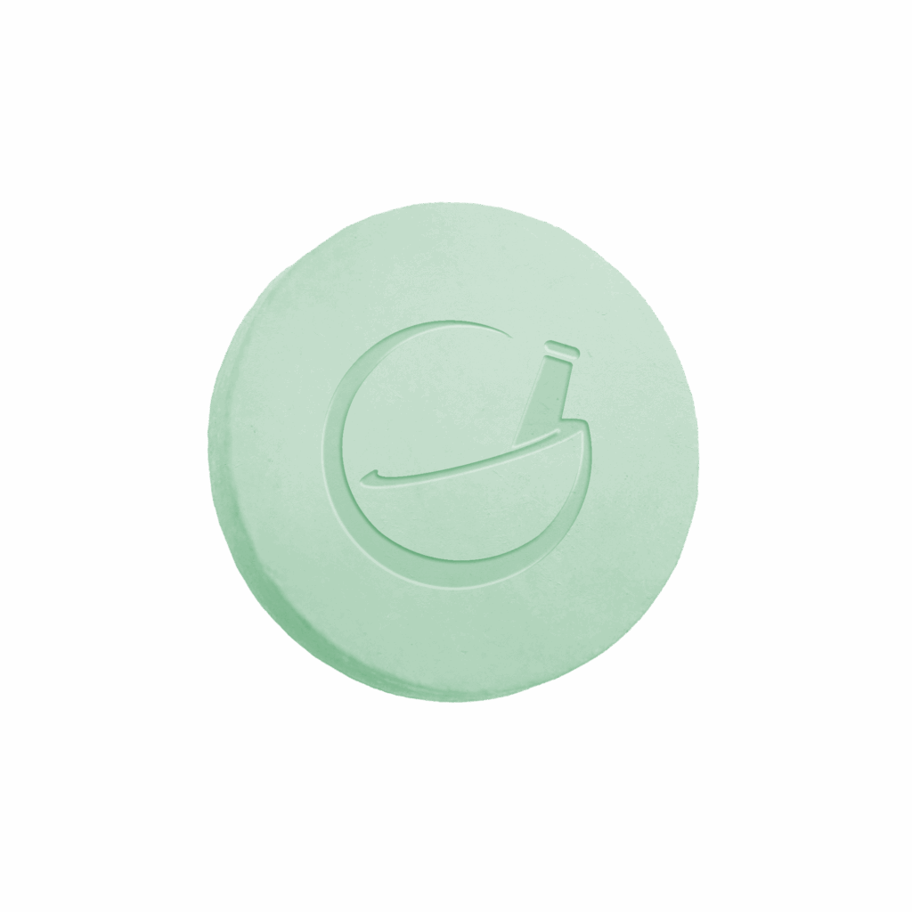 Green rapid-dissolve tablet (ED RDT) with Olympia Pharmacy logo imprint