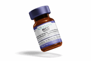 Olympia MICC Injection vial (10 mL) with purple cap, shown tilted on a black background.